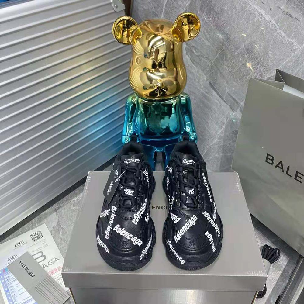 Close-up on Balenciaga logotype detail on sneaker tongue and side