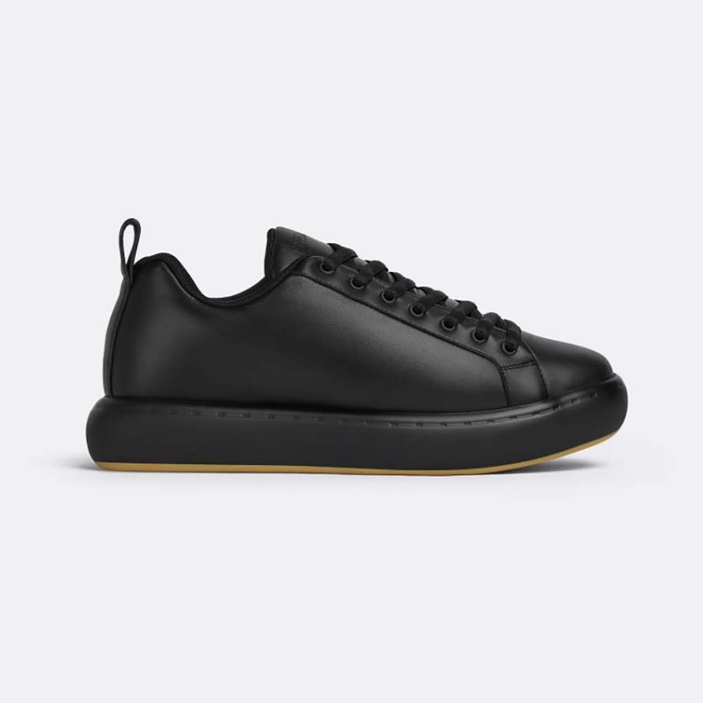 Side view of Bottega Veneta Unisex Pillow Sneaker Padded Leather Lace-up Sneakers-Black
