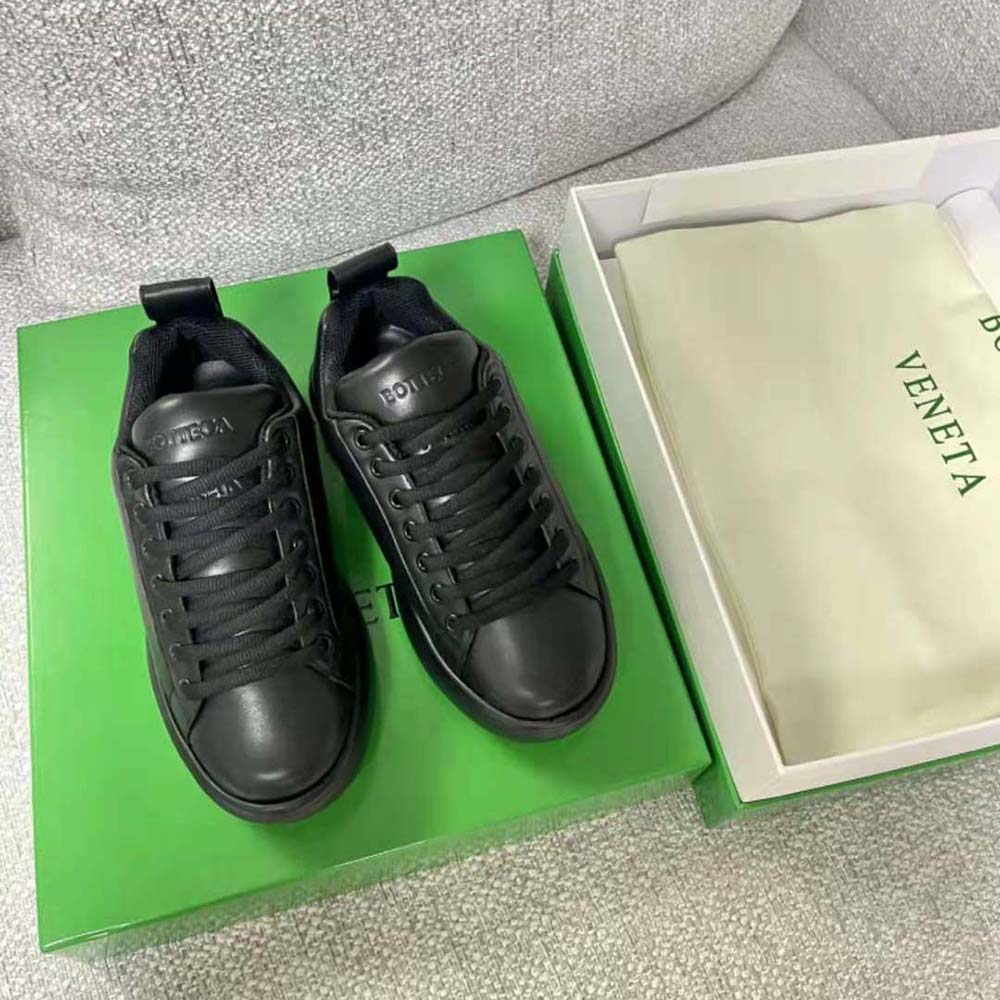 Close-up of padded black leather and laces on Bottega Veneta Pillow Sneakers