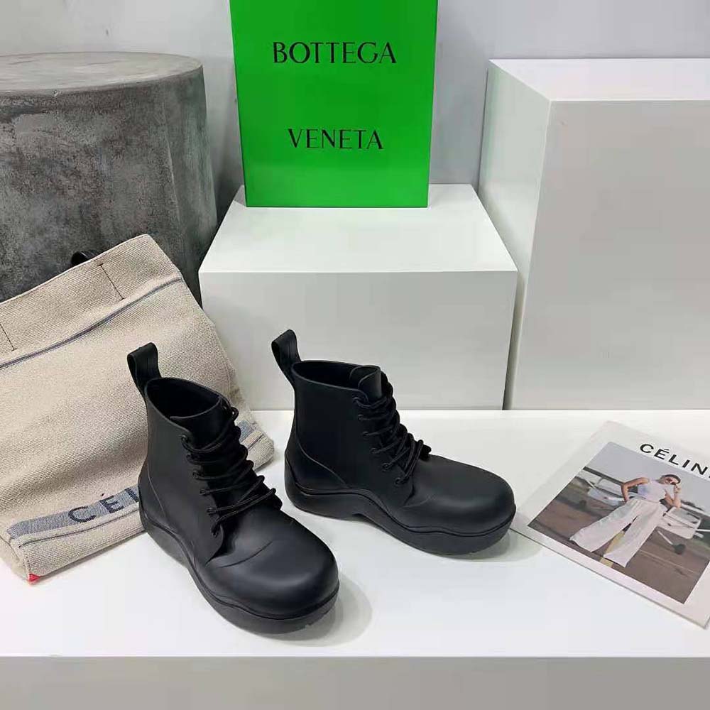 Close-up of lace-up detail on Bottega Veneta Unisex Puddle Boot