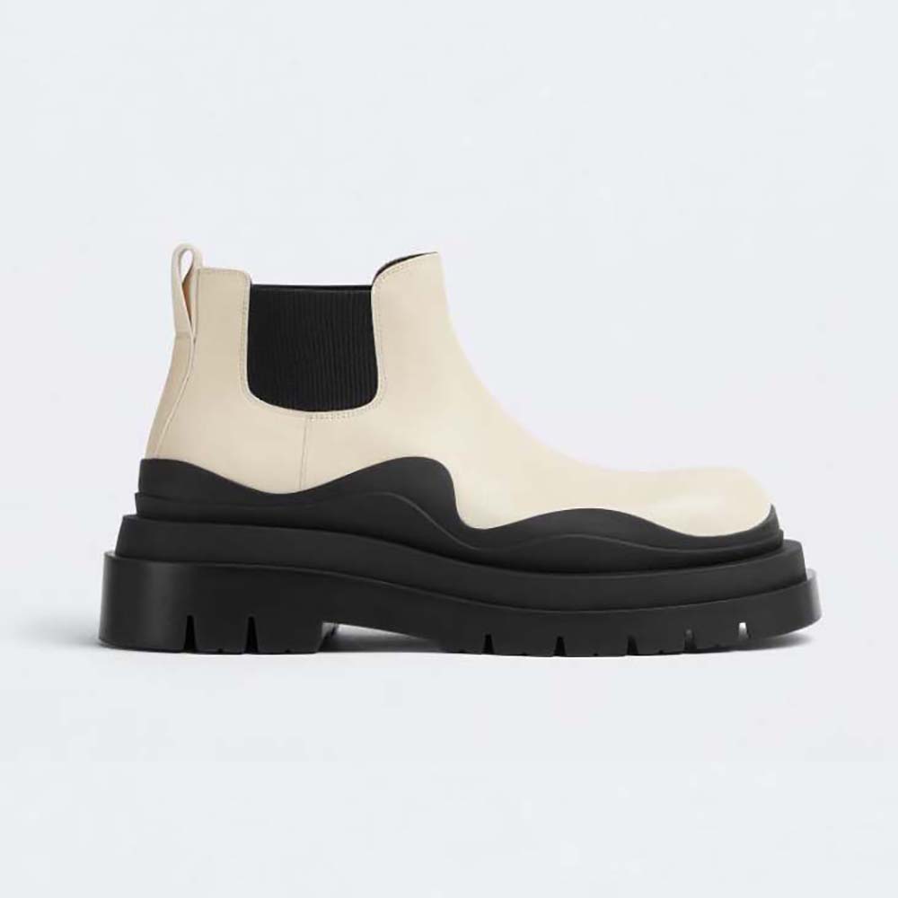 Side angle of Bottega Veneta Unisex Tire Ankle Chelsea Boot-White showing sole
