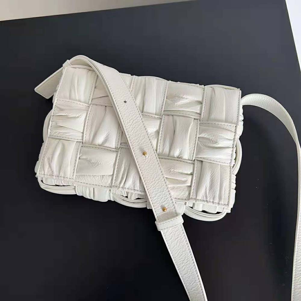 Side angle showcasing compact silhouette of Bottega Veneta Women Cassette Foulard Cross-Body Bag