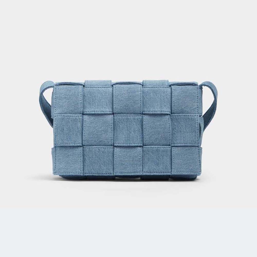 Front view of Bottega Veneta Women Cassette Intreccio Washed Denim Cross-Body Bag in navy
