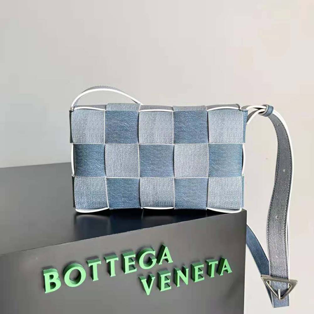 Side profile showing matte gold hardware on Bottega Veneta crossbody bag