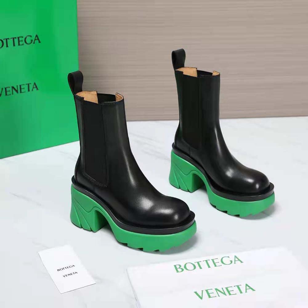 Back angle showing elastic side panels on Bottega Veneta ankle boot