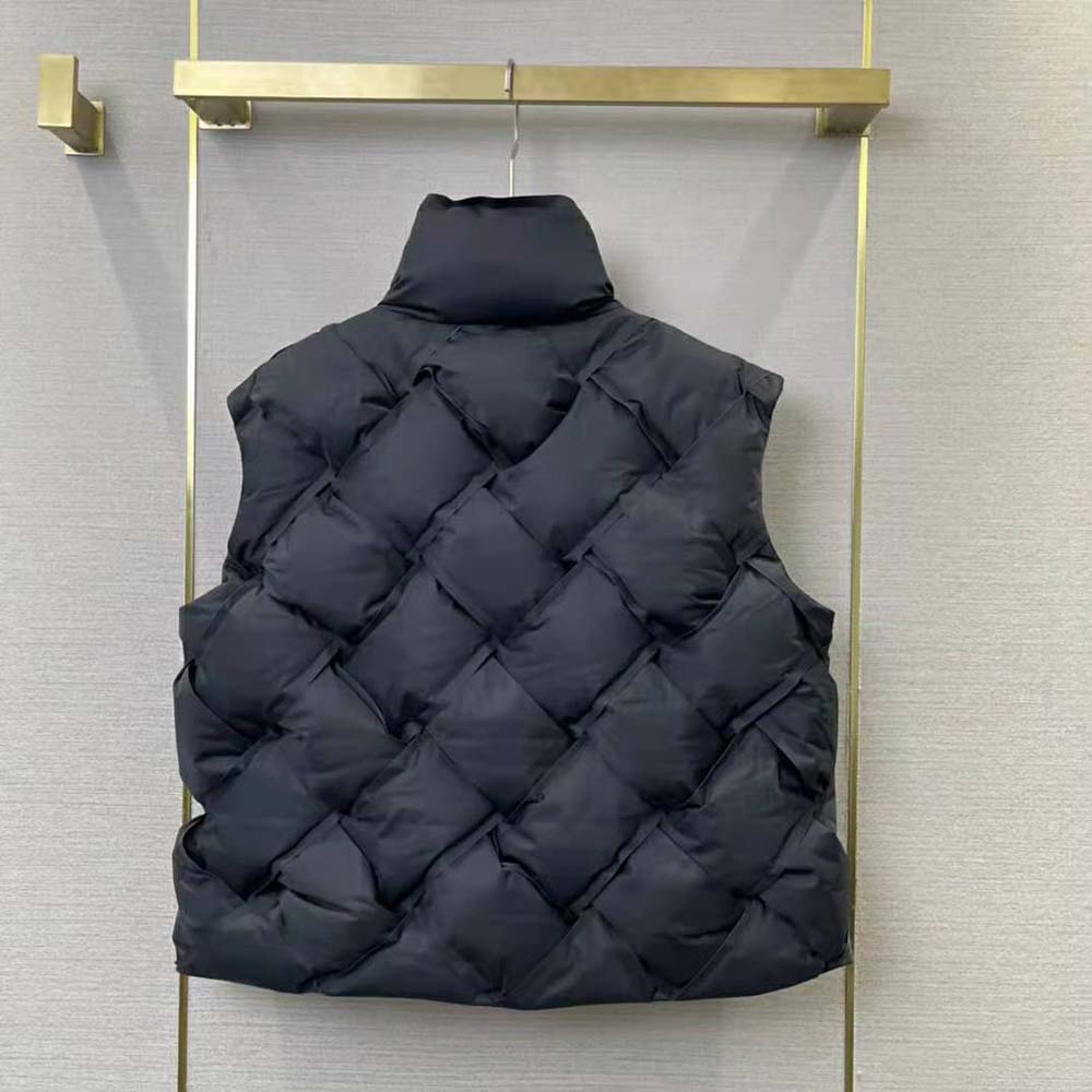Side profile showing zipper closure on Bottega Veneta black vest