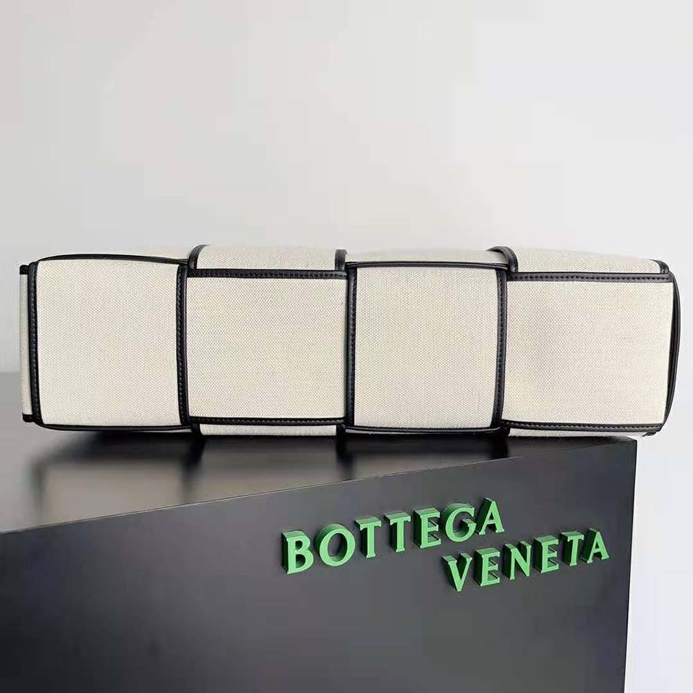 Side angle showing gold-tone hardware on Bottega Veneta tote