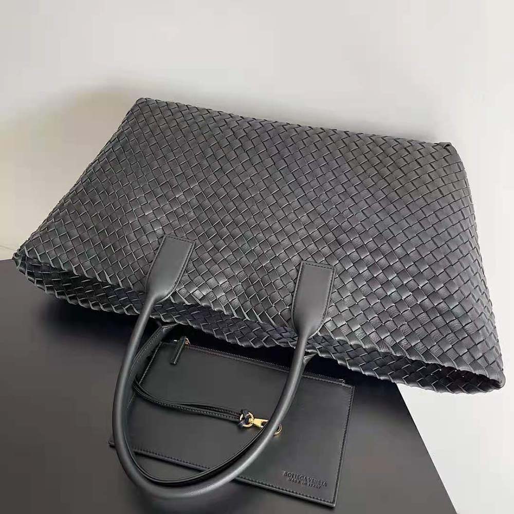 Side angle showing structured silhouette of Bottega Veneta Medium Cabat Tote