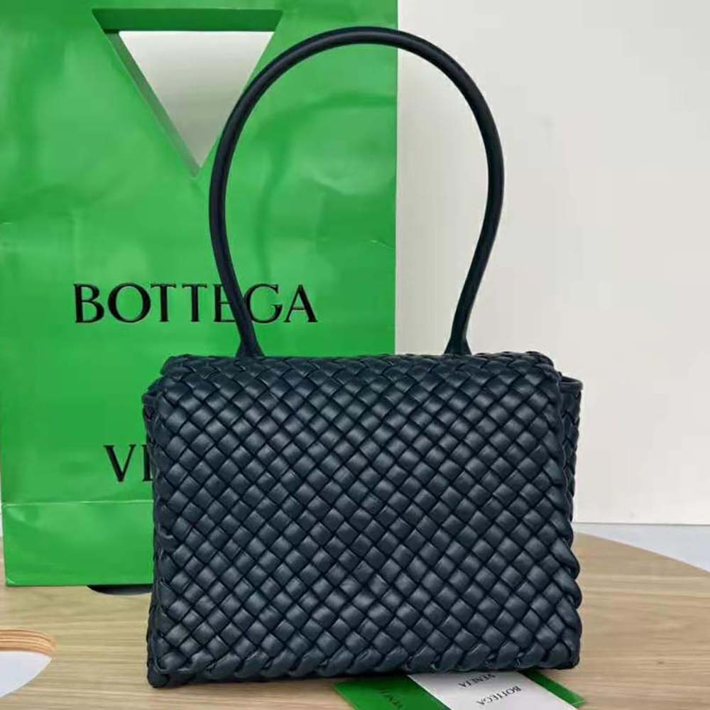 Close-up of gold-tone hardware on Bottega Veneta Women Patti Top Handle Bag