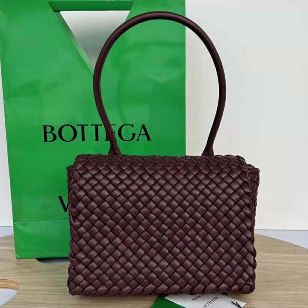 Side angle showing polished gold-tone hardware on Bottega Veneta Patti bag