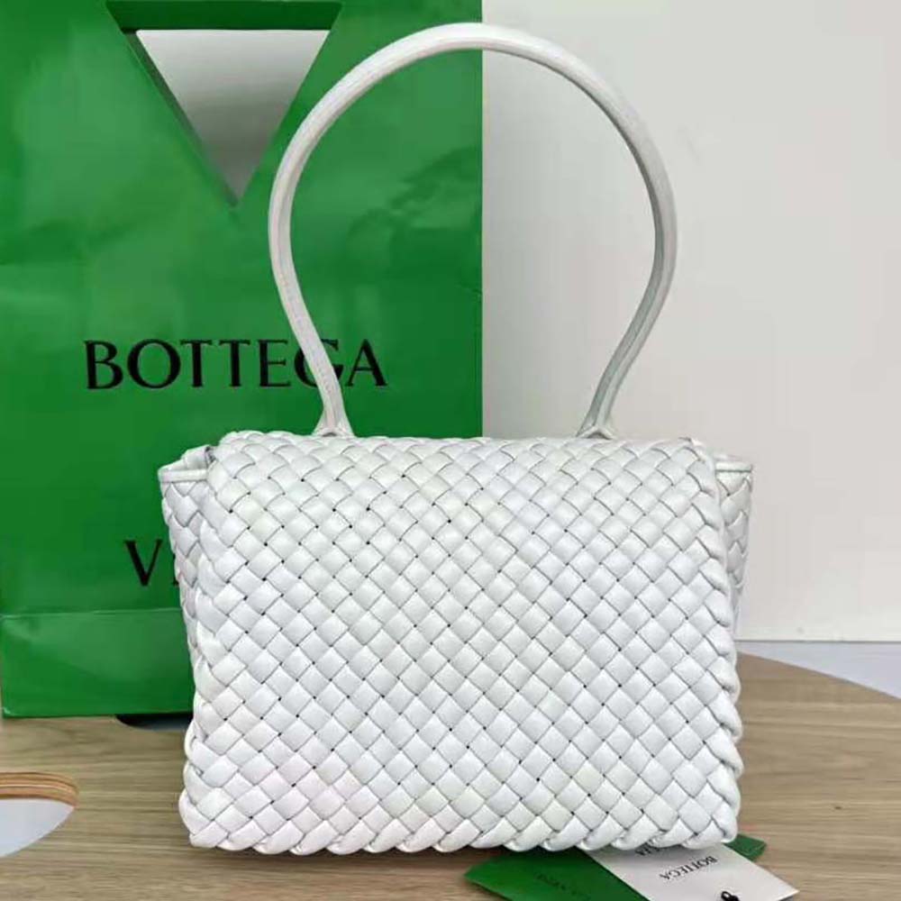 Close-up of woven lambskin detail on Patti Top Handle Bag white