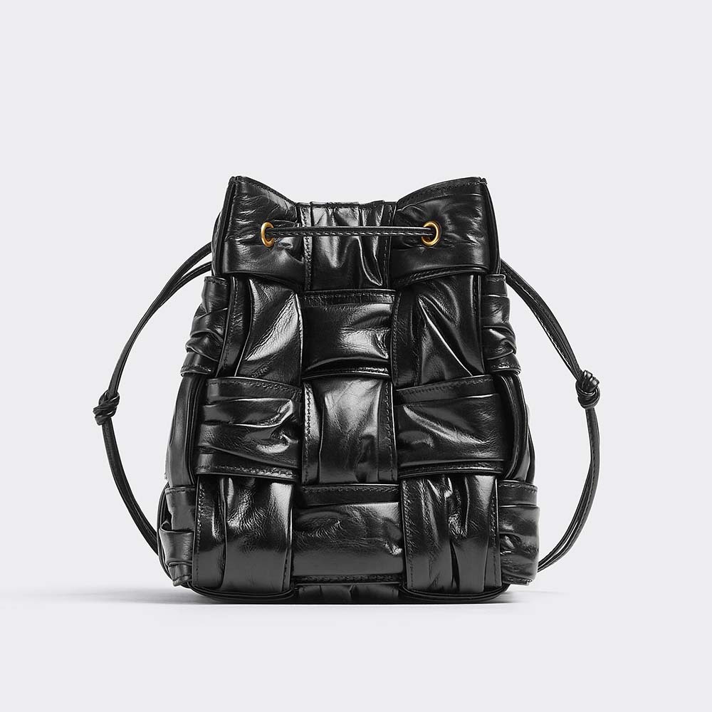Front angle of Bottega Veneta Women Small Cassette Bucket Bag in Black lambskin