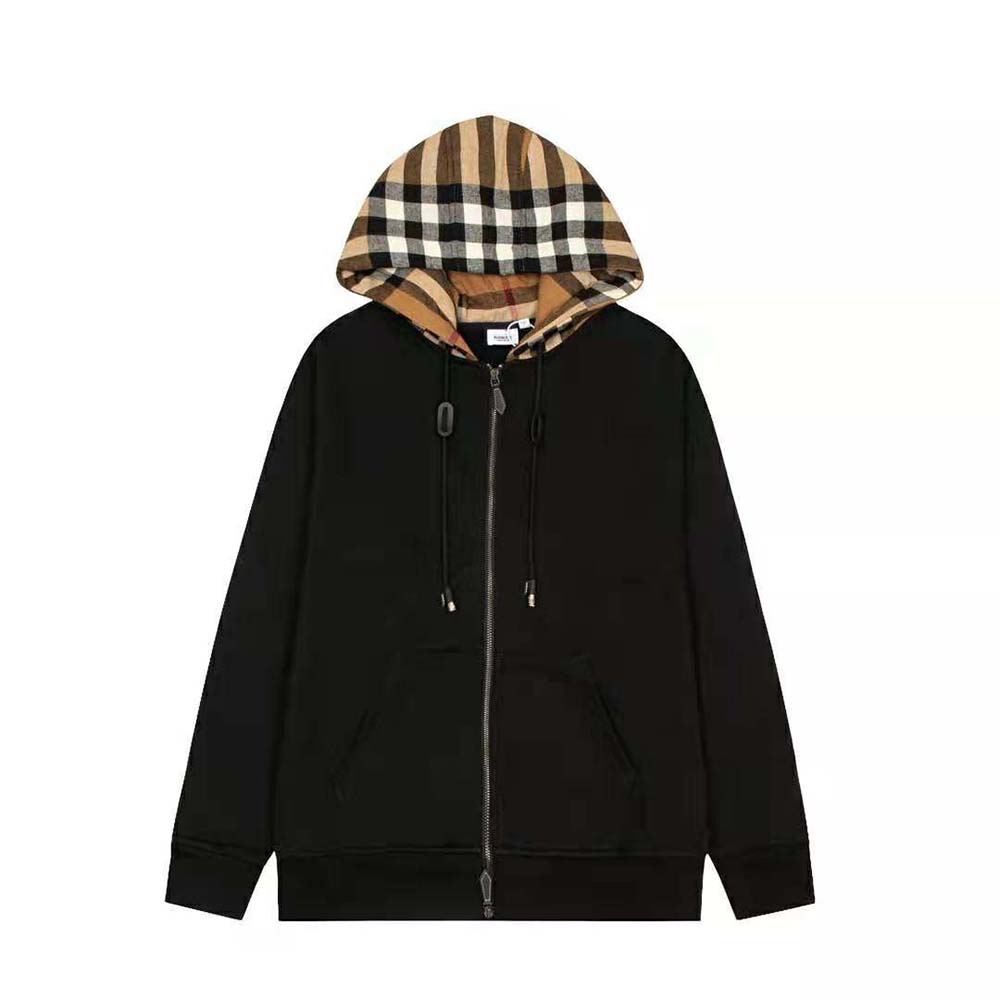 Close-up of hood lining with Burberry check on black cotton top