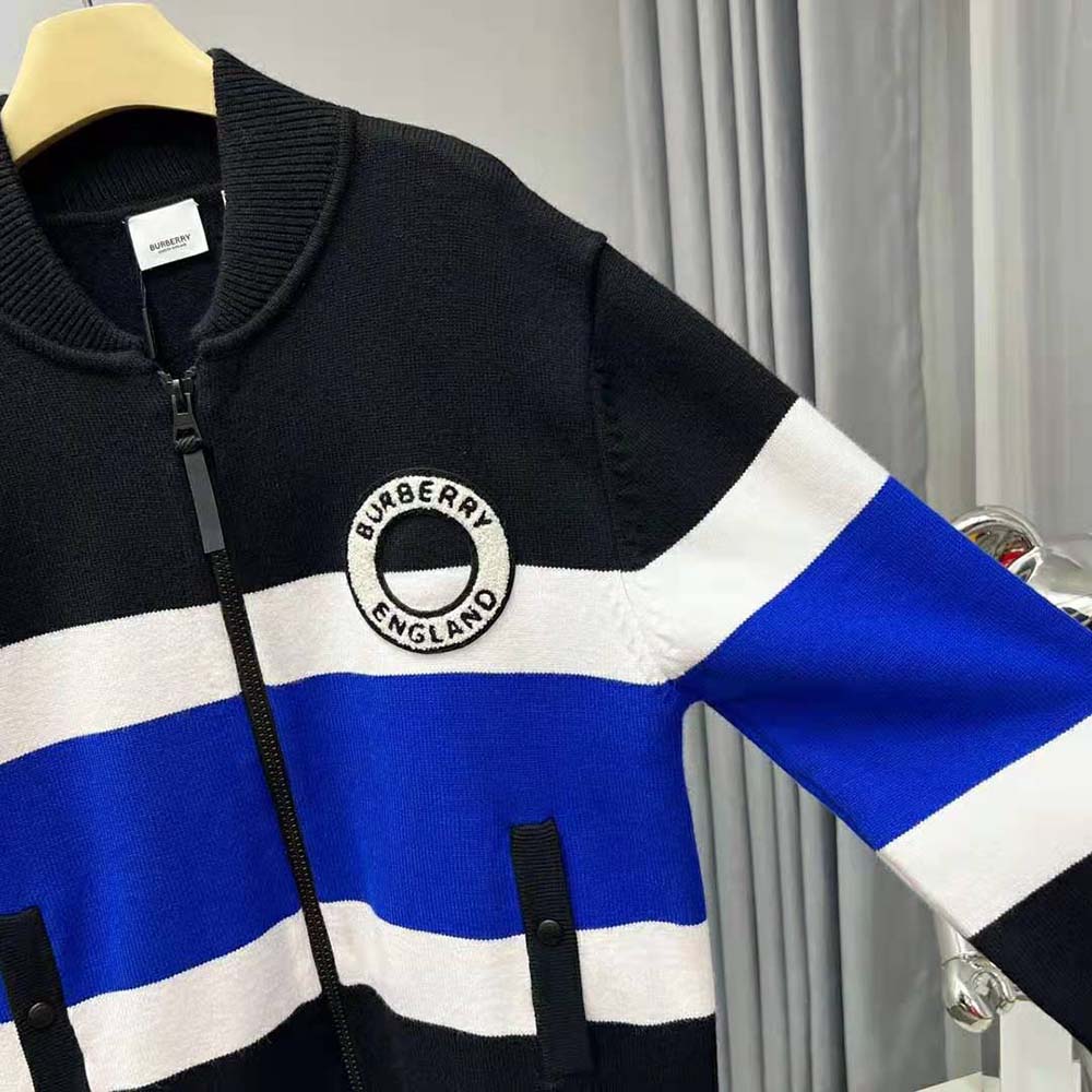 Back view showing silhouette of Burberry Women Logo Graphic Striped Wool Blend Bomber Jacket