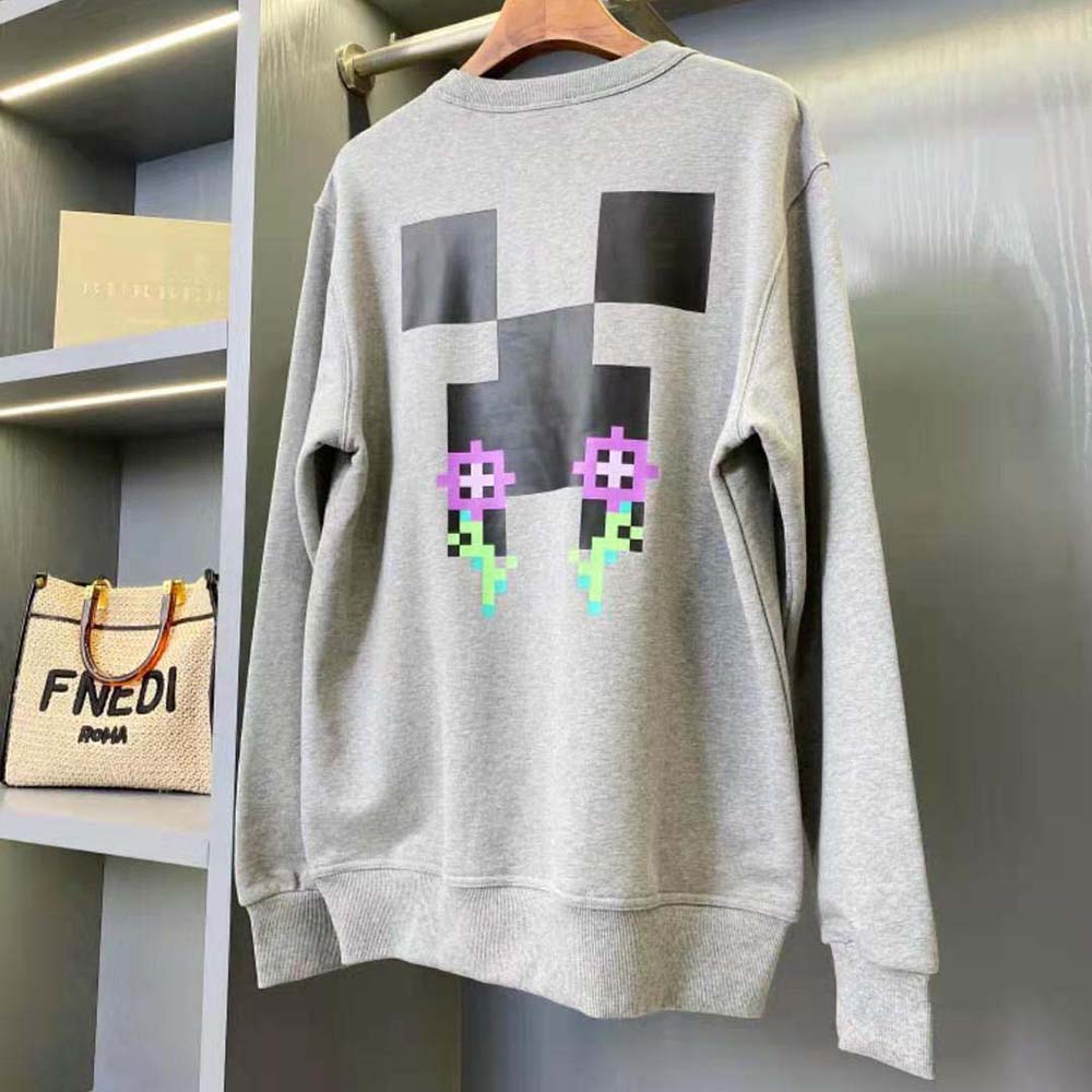 Side angle showing relaxed fit of Burberry Women Monogram Motif Print Cotton Sweatshirt