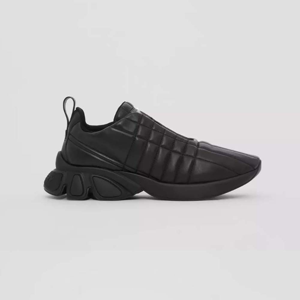 Side view of Burberry Unisex Quilted Leather Classic Sneakers-Black showing quilting