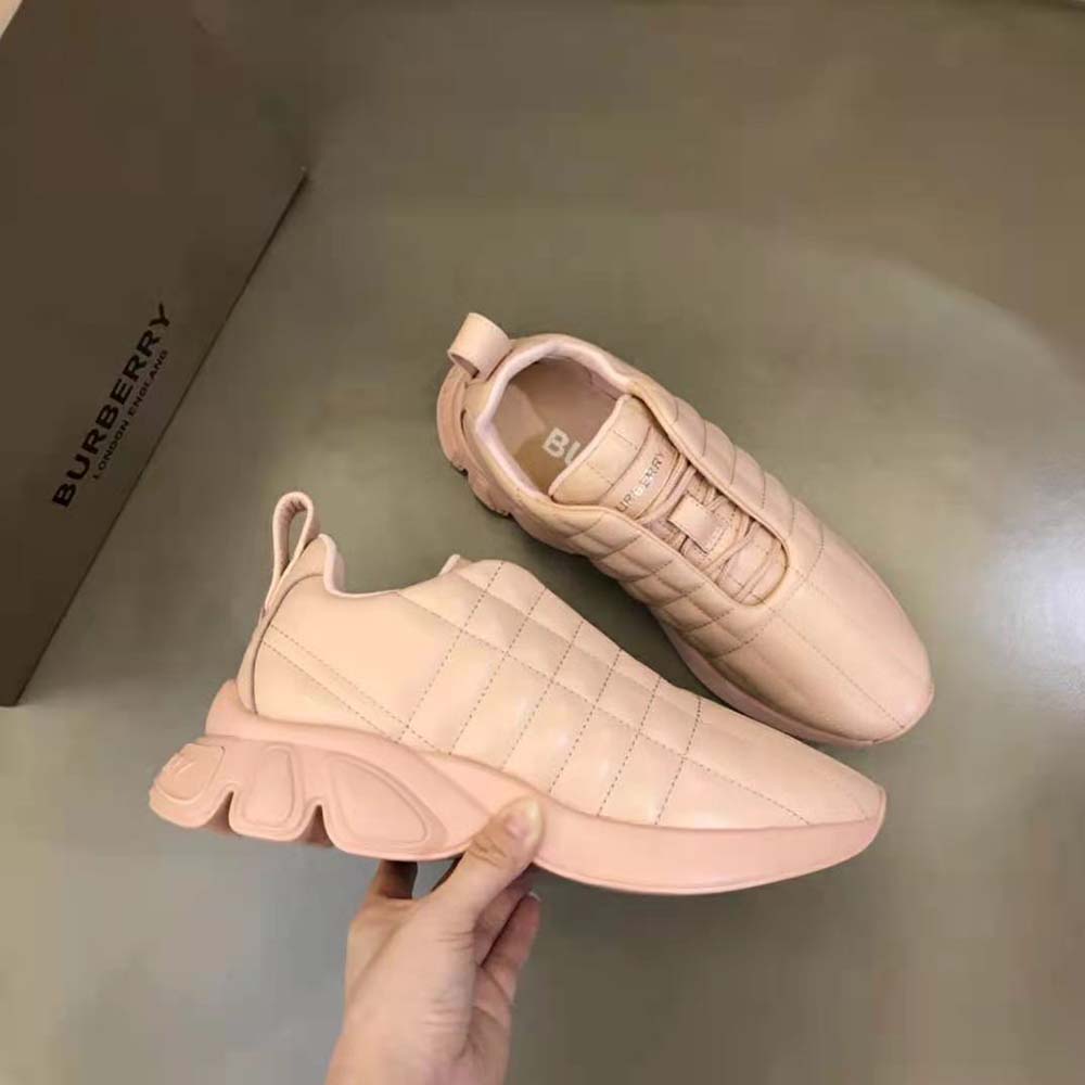 Overhead shot showing lace-up closure of Burberry classic sneakers