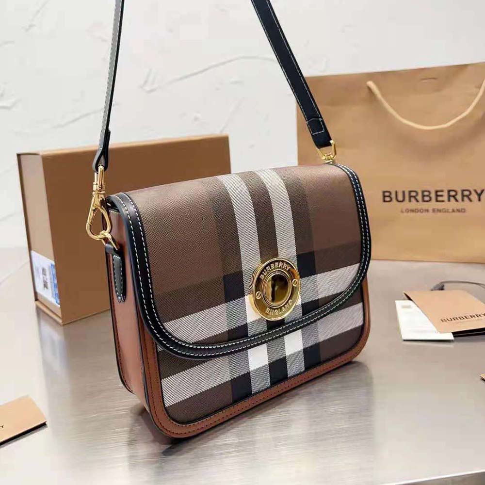 Close-up of polished gold hardware on Burberry Small Elizabeth Bag