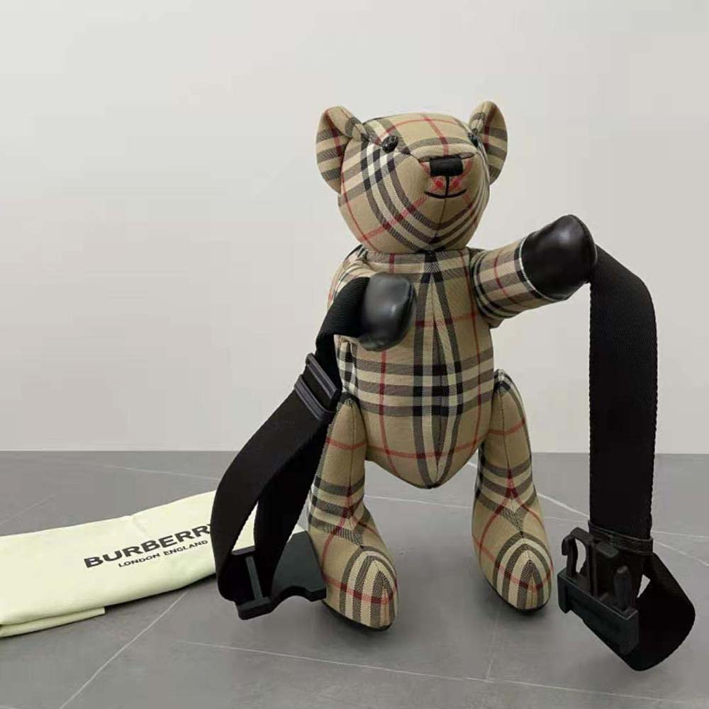 Close-up of signature Thomas Bear detail on Burberry bum bag