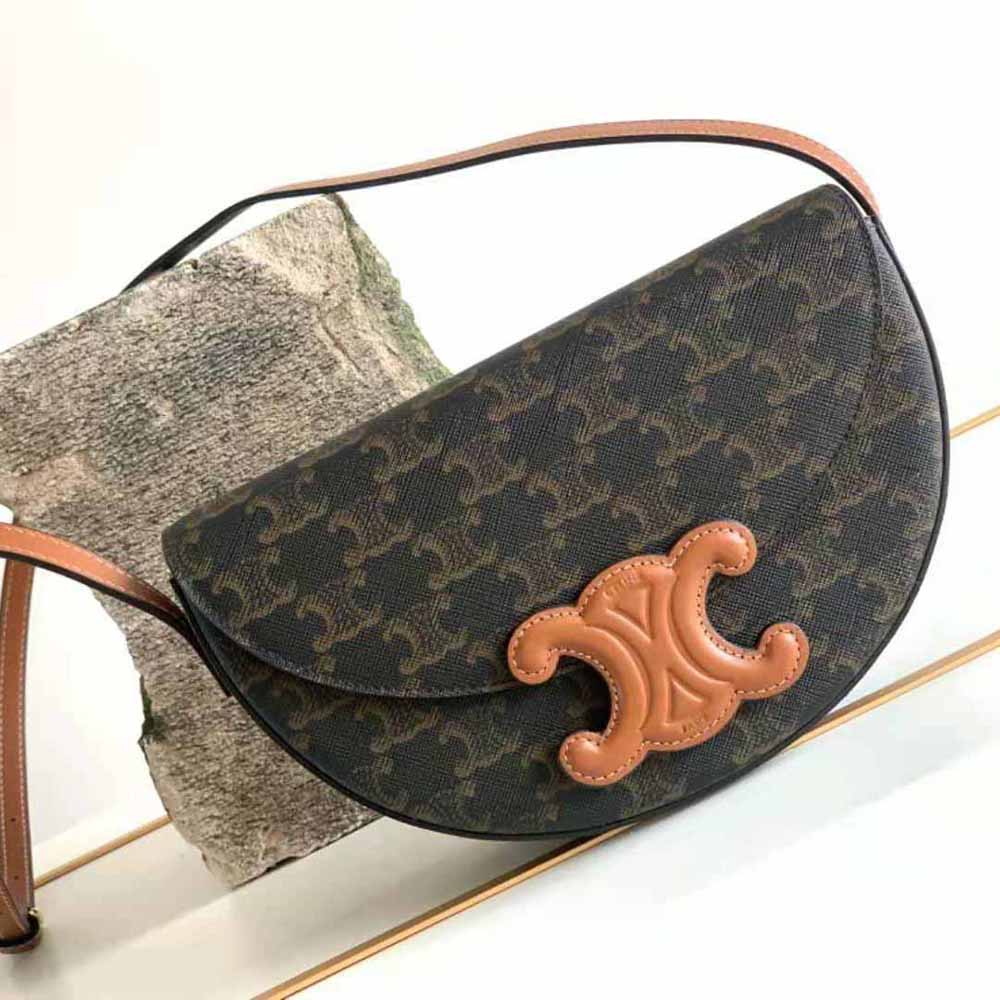 Side angle showing slim silhouette of Celine Women Besace Cuir Triomphe
