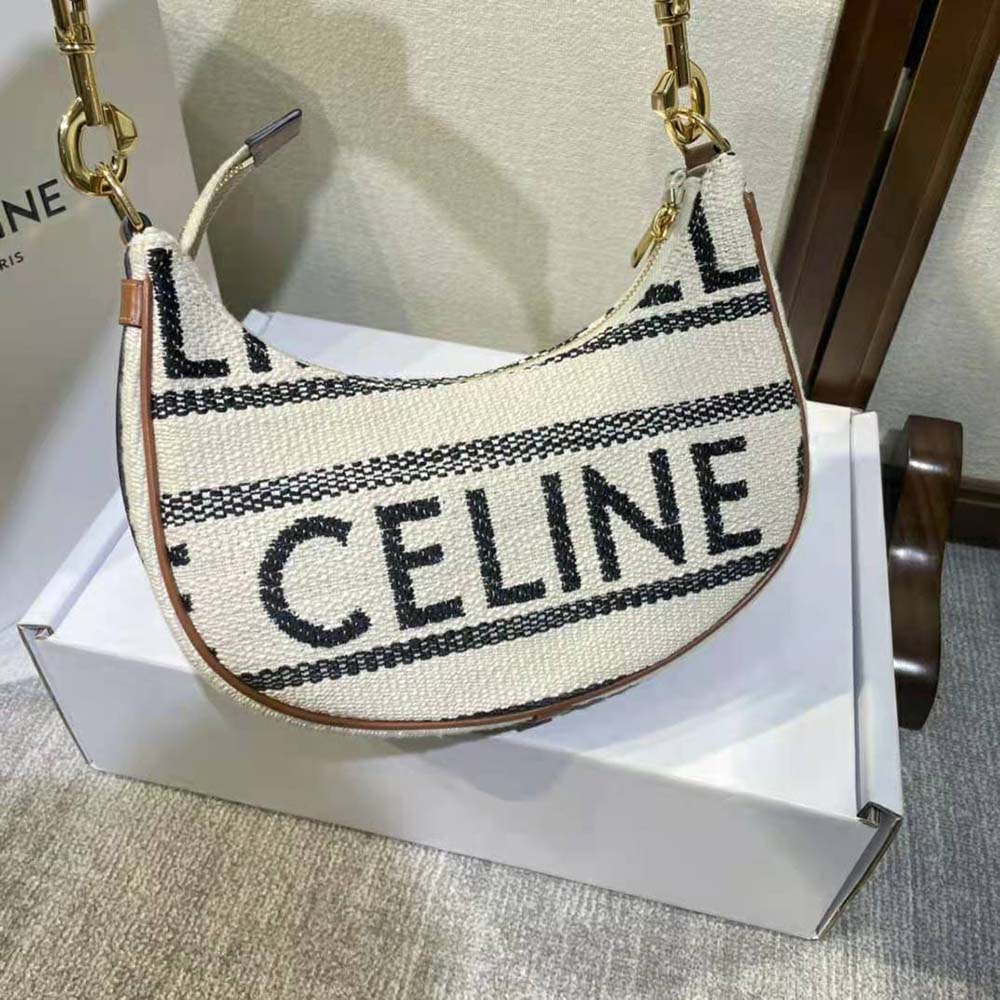 Side angle showing adjustable strap detail on Celine Medium Ava Strap Bag