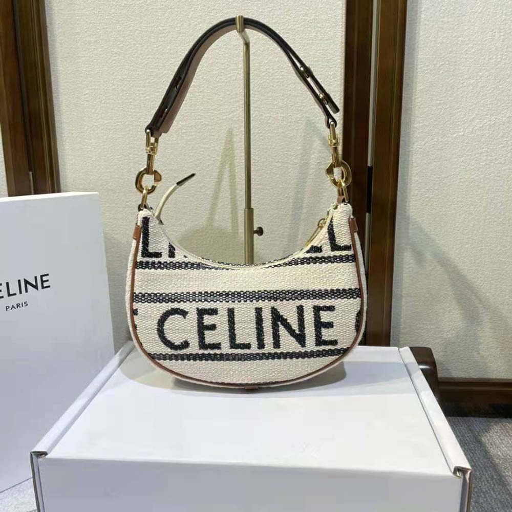 Close-up of gold hardware and Celine monogram on Medium Ava Strap Bag