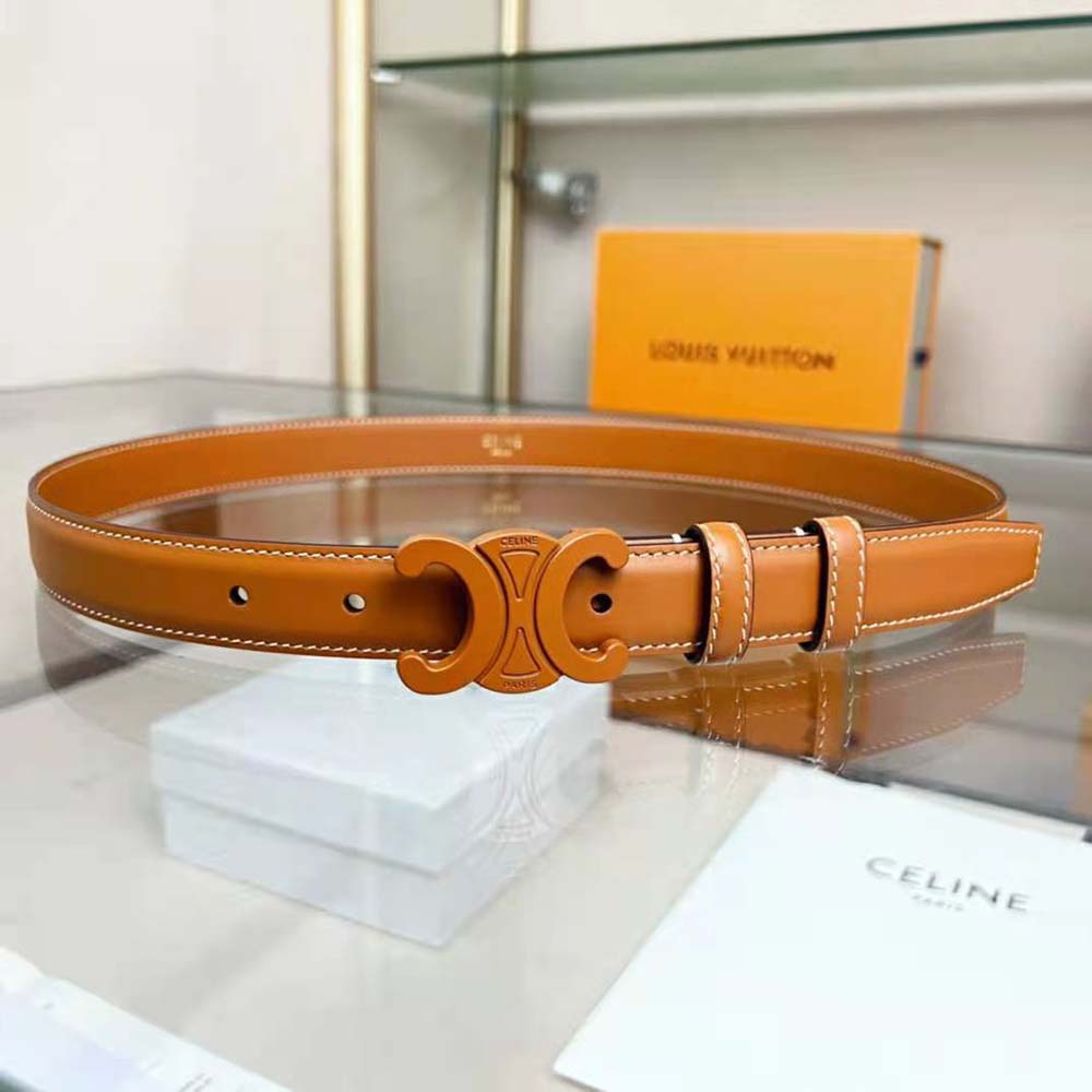Close-up of gold-tone Triomphe buckle on Celine medium calfskin belt