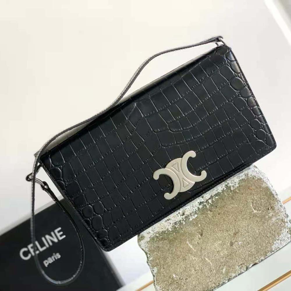Close-up of gold Triomphe hardware on Celine Women Trapeze Triomphe Bag