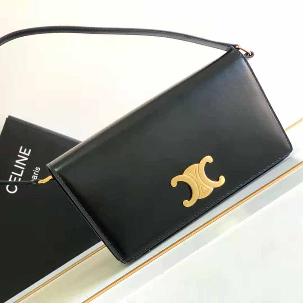 Close-up of gold Triomphe clasp on Celine Women Trapeze Triomphe Bag