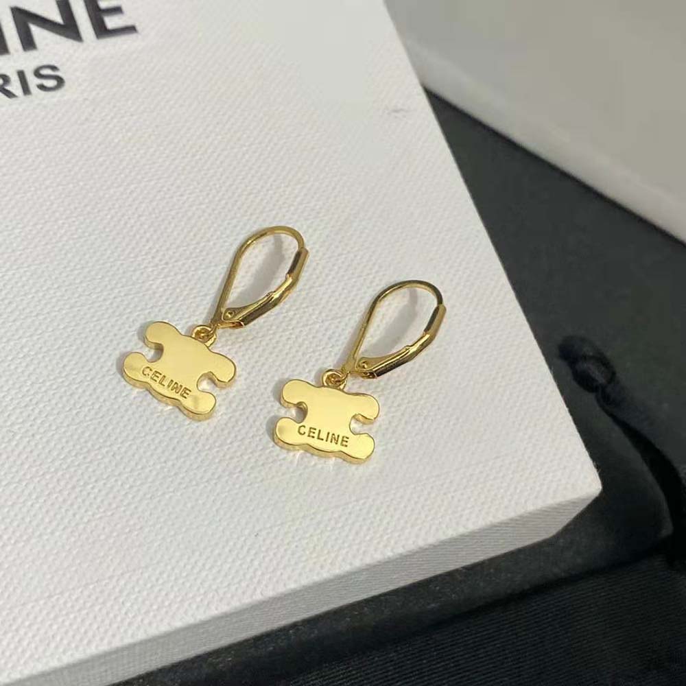 Side angle showing clasp and silhouette of Celine Women Triomphe Earrings