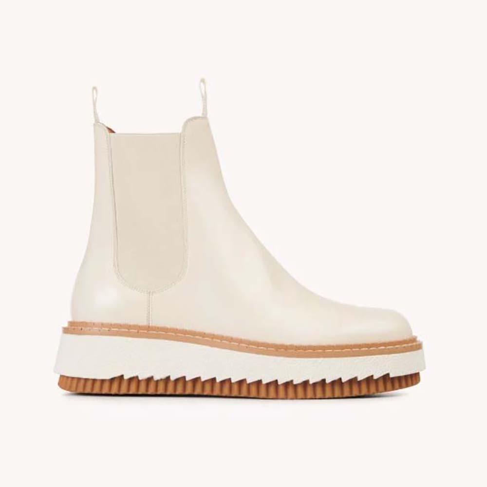 Side view of Chloe Women Kurtys Flat Chelsea Boot in beige suede