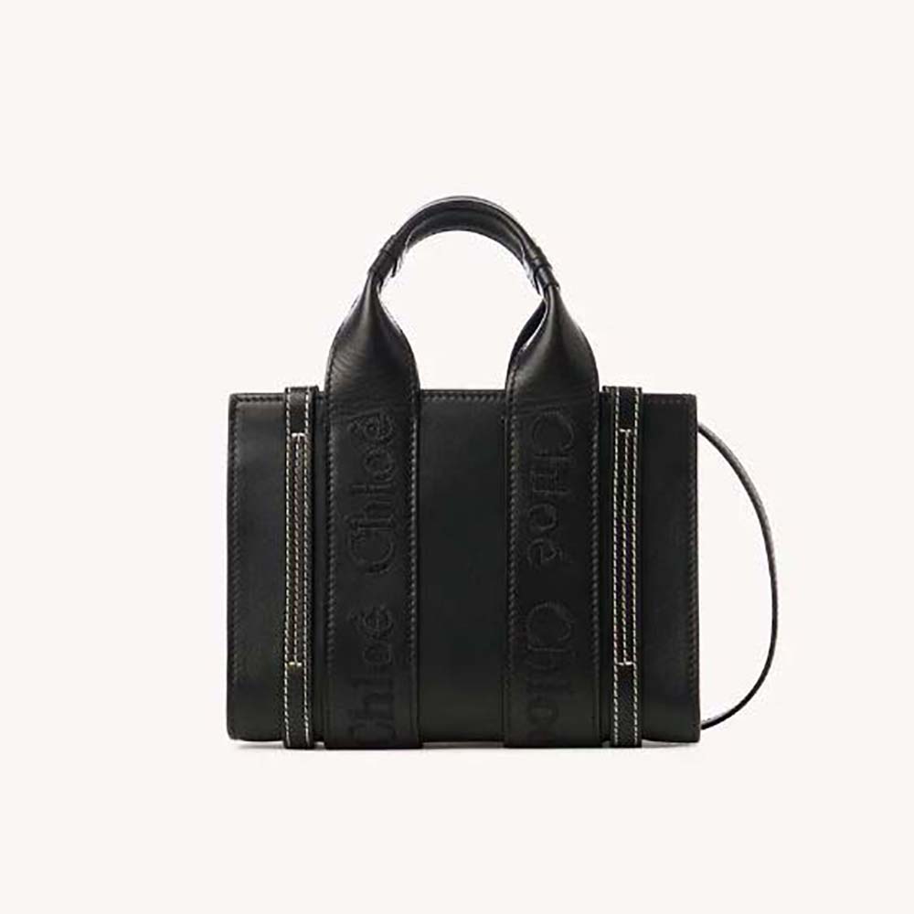 Front angle view of Chloe Women Mini Woody Tote Bag-Black with wooden handle
