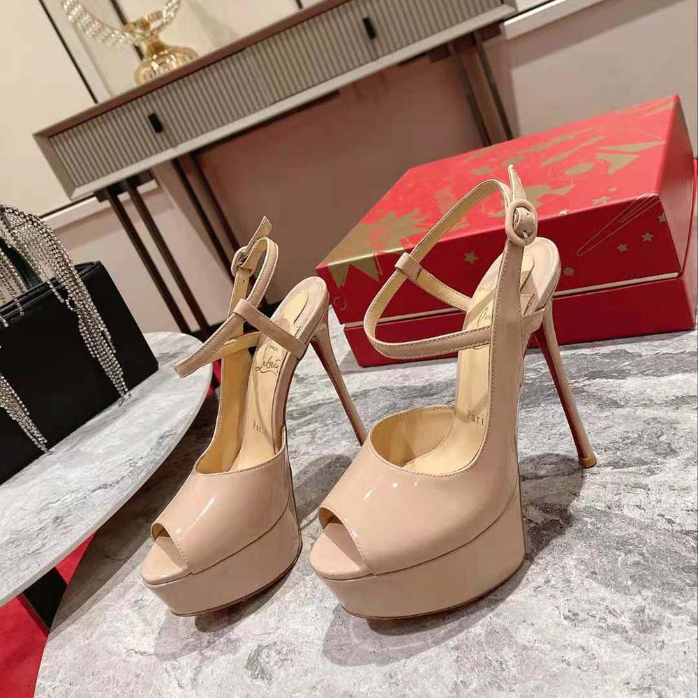 View of red lacquered sole on Christian Louboutin Women So Jenlove Alta Sandy heels