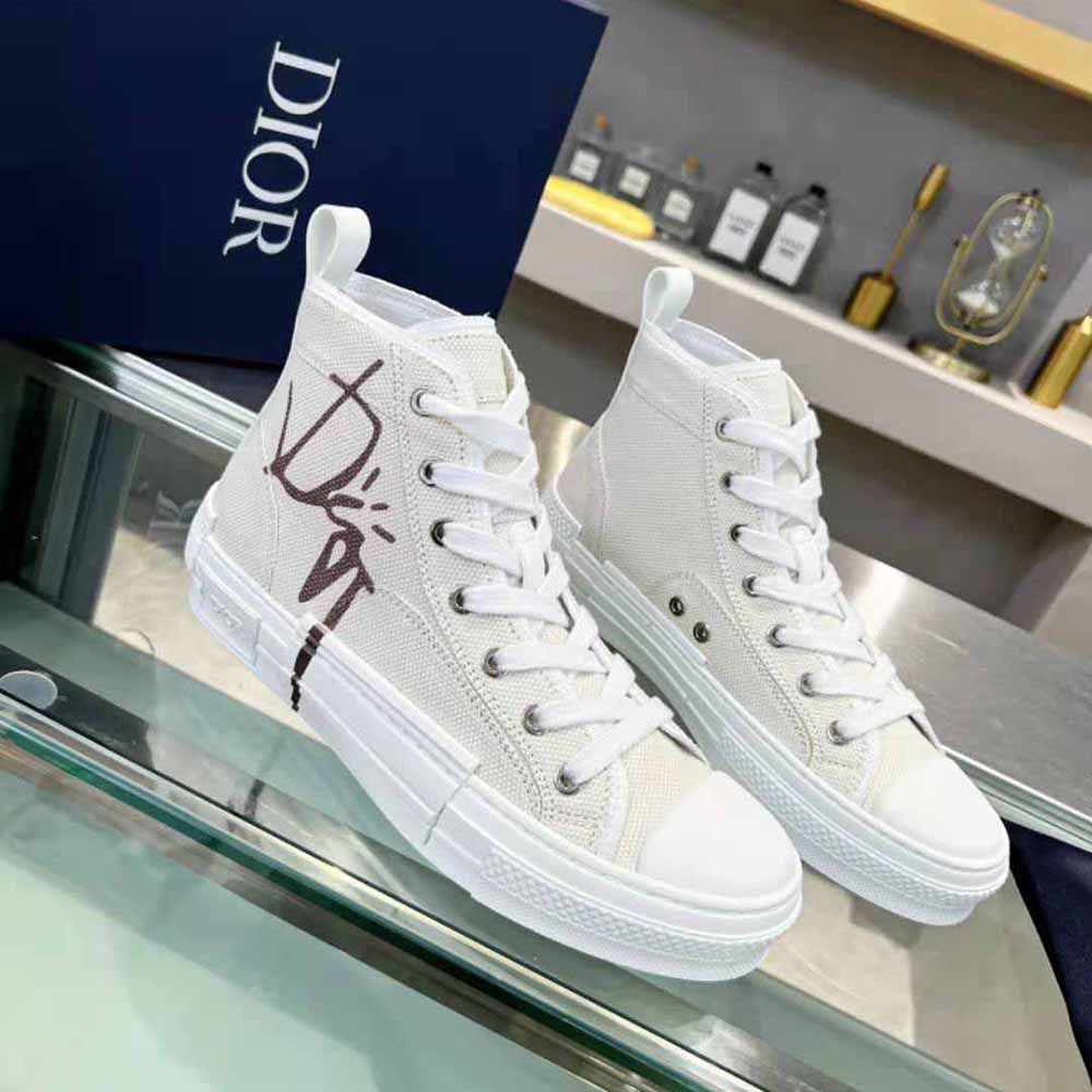 Close-up of signature Dior and Cactus Jack details on sneaker canvas