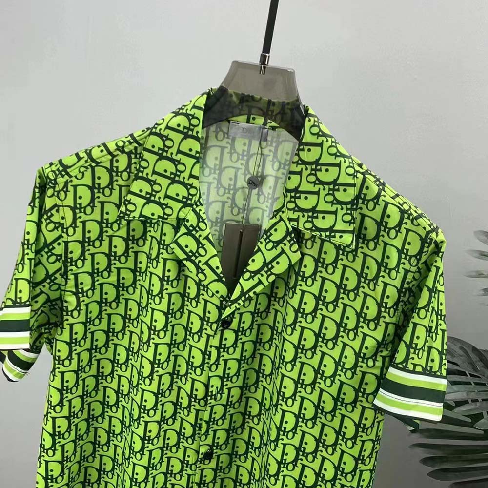 Side angle showing relaxed fit of Dior Men Chez Moi short-sleeved shirt