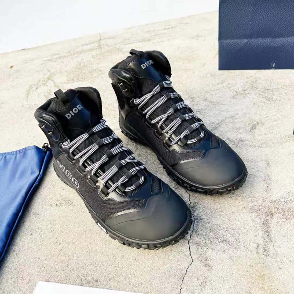 Close-up detail of signature Dior logo on Dior Men Diorizon Hiking Boot