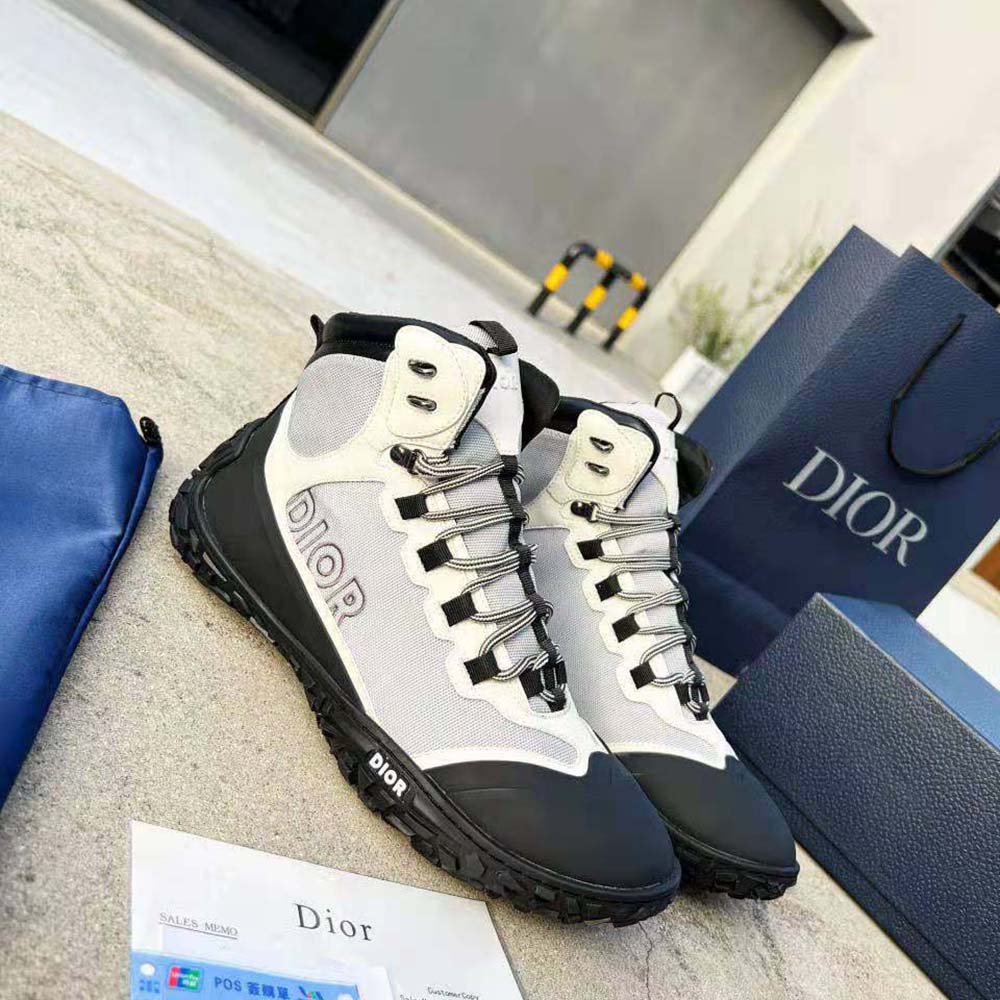 Close-up of lace and Dior metal logo on Dior Men Diorizon Hiking Boot