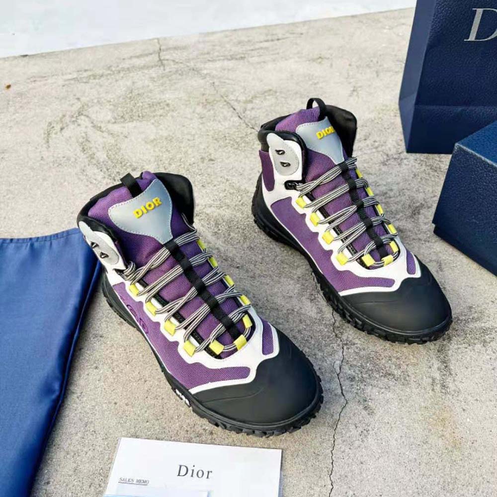 Close-up on black rubber sole and Dior branding details