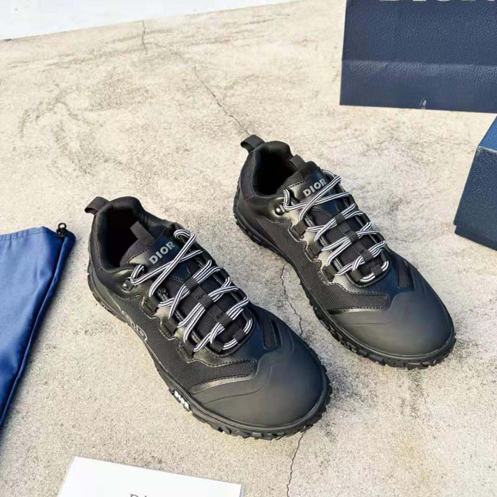 Close-up of lacing and black rubber on Dior Men Diorizon Hiking Shoe
