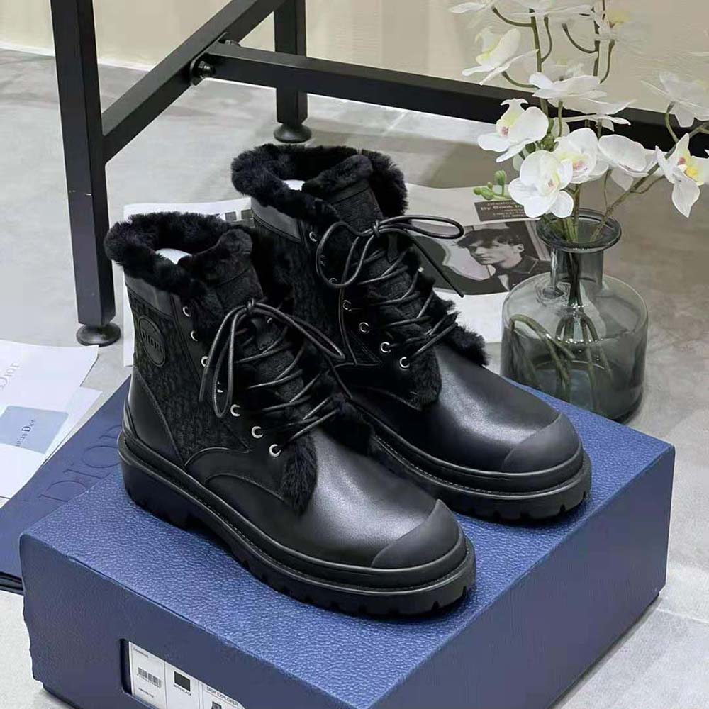Close-up of Dior Oblique jacquard detail on black ankle boot