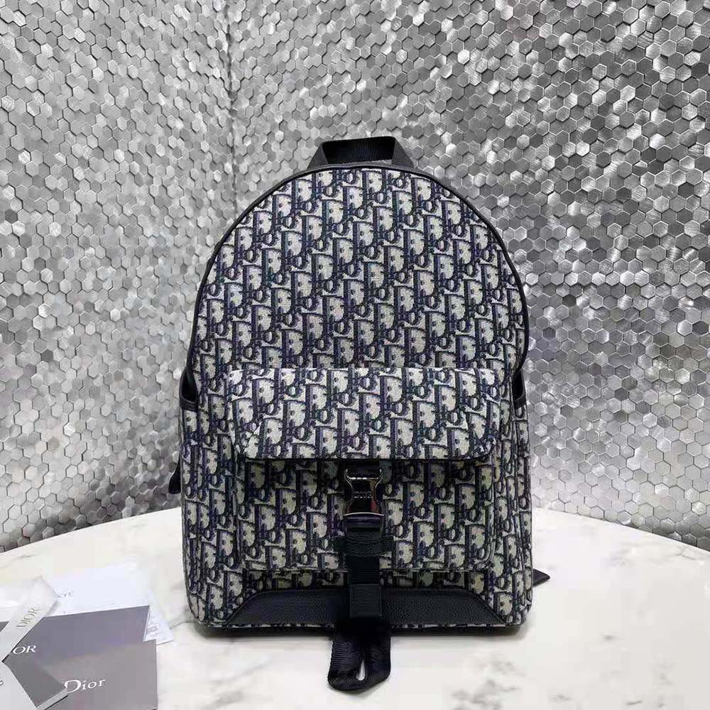 Close-up of black Dior Oblique jacquard texture and silver hardware details