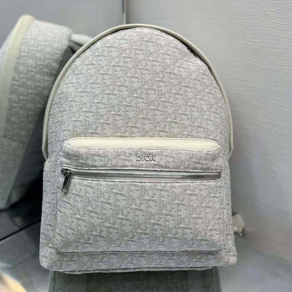 Side angle showing adjustable straps on Dior Men Rider Backpack Beige Dior Oblique Jacquard