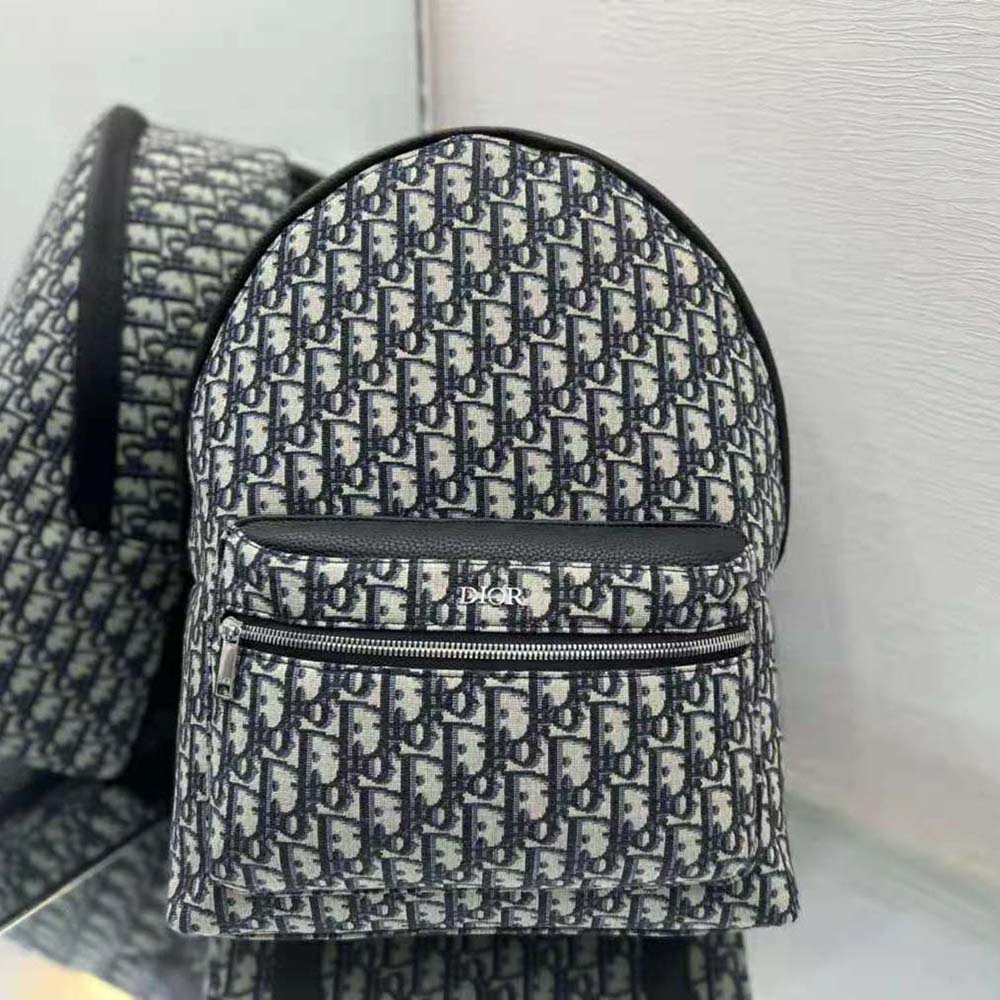Side angle showing adjustable straps on Dior Men Rider Backpack Dior Oblique