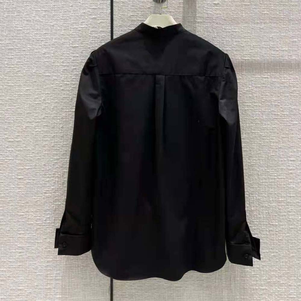 Side angle showing silhouette of Dior Women Blouse with Ruffles Black Cotton Poplin