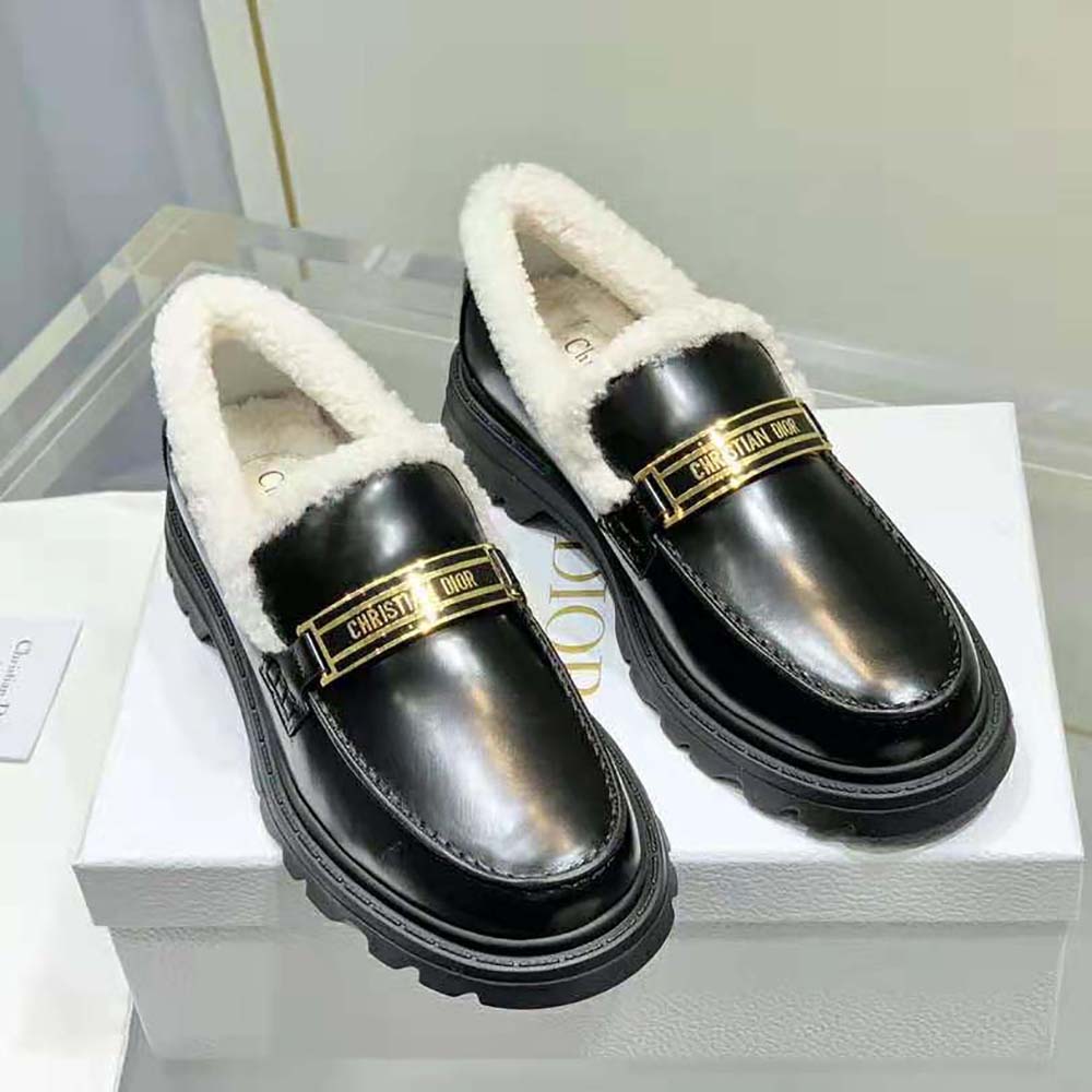 Close-up of Dior silver-tone hardware on Women Code Loafer black leather