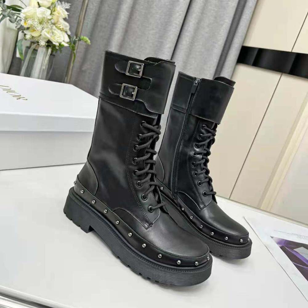 Top view showing zipper and calfskin texture on Dior Women Diorquake Ankle Boot