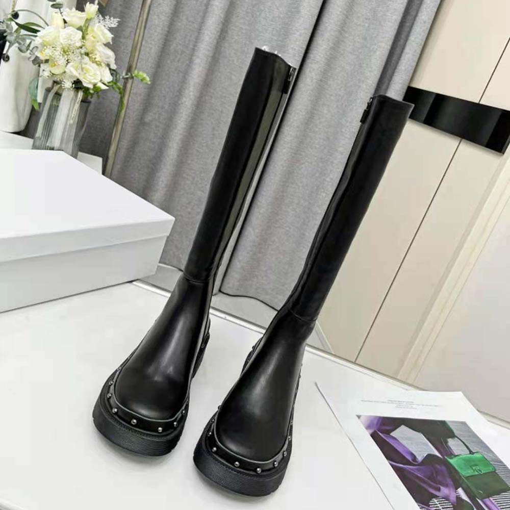 Dior Women Diorquake Boot Black Calfskin viewed from front, highlighting silhouette