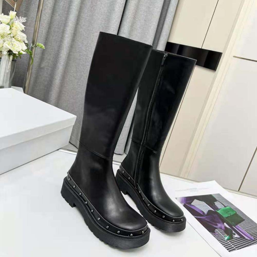 Close-up of black calfskin and lacing on Dior Women Diorquake Boot Black Calfskin