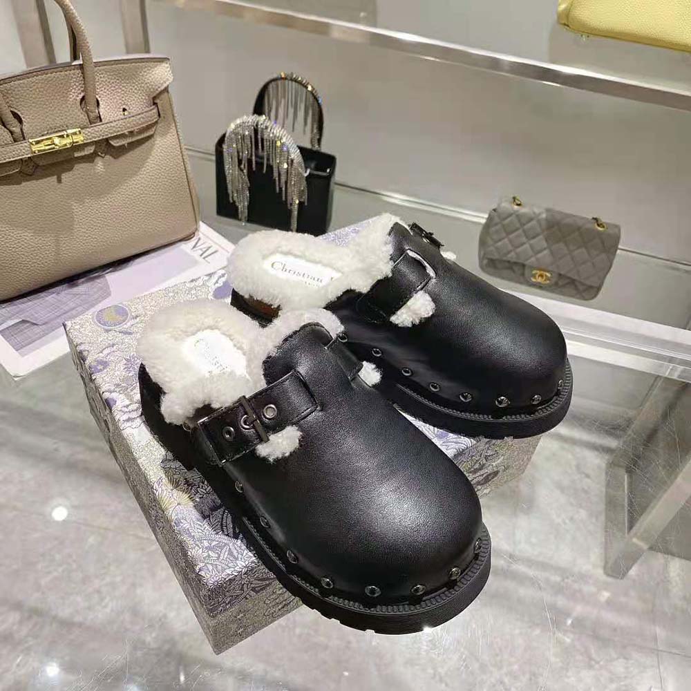 Top-down angle showcasing black calfskin and slip-on silhouette of Diorquake clog