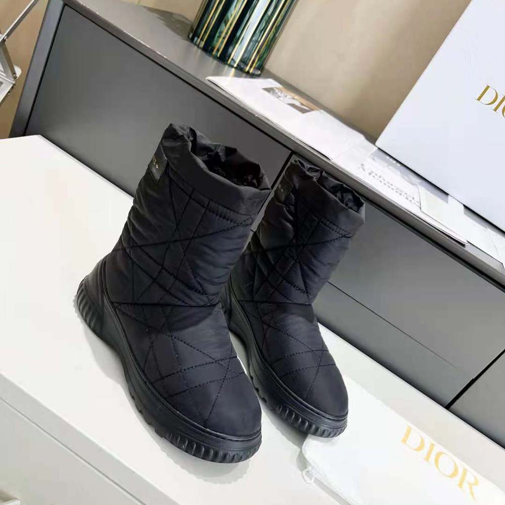 Close-up of silver-tone hardware on Dior Women Frost Ankle Boot Black Cannage